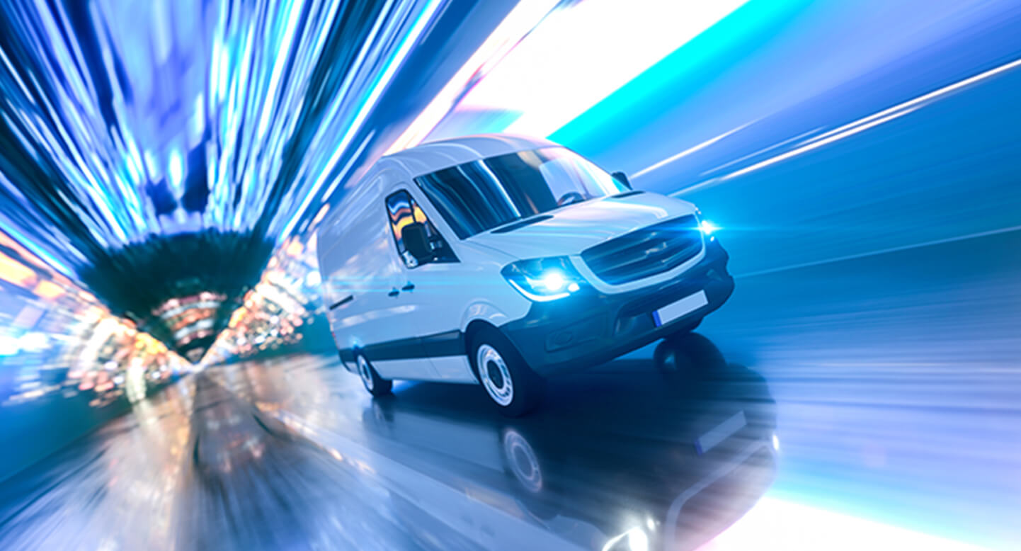 White van speeding through a futuristic, neon-lit tunnel with a motion blur effect.